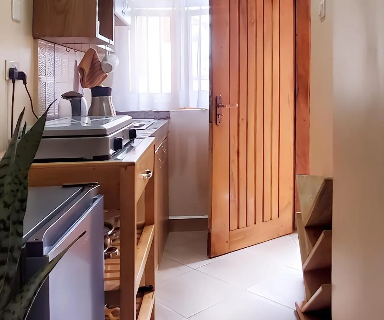 Orchid Gardens; Studio Apartment, Minimalist Kampala Apartment